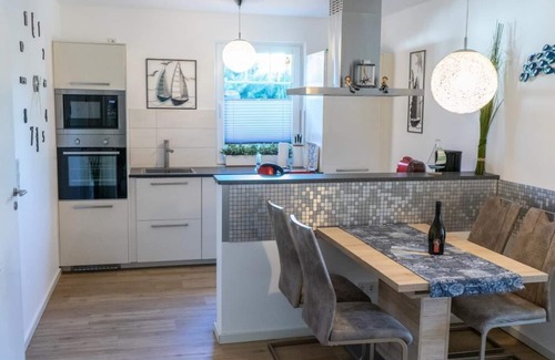 Born auf dem Darss Apartment | @Home - sun terrace, barbecue, dogs allowed, sauna, close to the Bodden, Baltic Sea 6km away, washing machine, WLAN