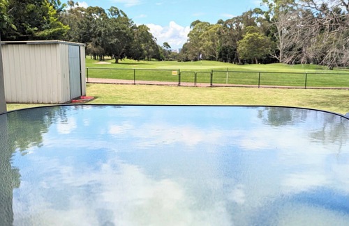 Kearneys Spring House | Home with Golf Course Frontage !