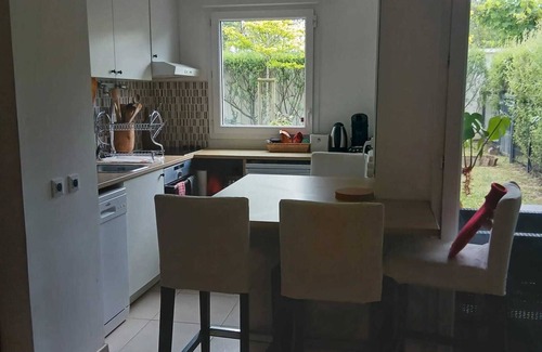 La Grace de Dieu Sud Apartment | Homerez - Cozy Apartment in Caen with Terrace and Garden