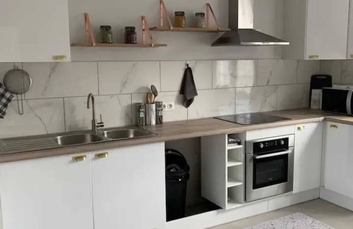 Pierrelaye Apartment | Homerez - Spacious apartment in Pierrelaye with garden view