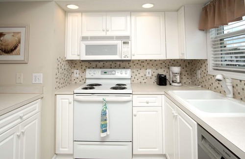 Cherry Grove Beach Condo | Homey condo w/private deck in quiet resort w/fabulous pool & Jacuzzi - one block from the beach