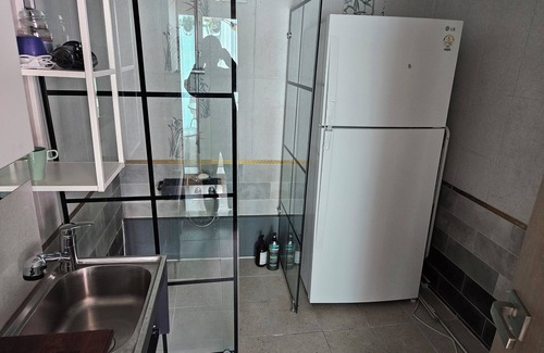 Seogyo-dong Bed & Breakfast | Hongdae: Spacious yard, group-friendly. Green, sunny, near biz—cozy
