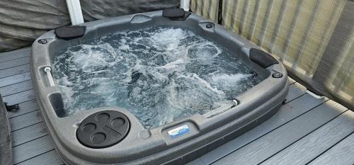 Grampound House | Hot Tub Lodge Cornwall - Meadow Lakes Holiday Park