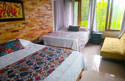 Calarca House | Hotel Chalet San Juan de Ticlan