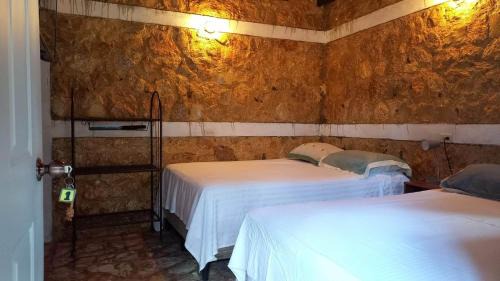 Flores Hotel | Hotel Colibrí Petén