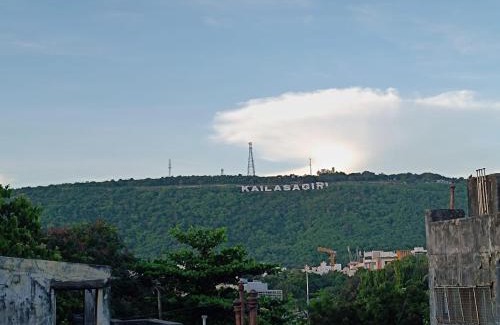 MVP Colony House | Hotel KP Suites Near RK Beach Vizag