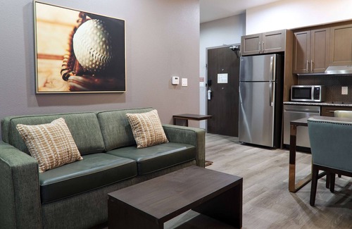 New Caney Hotel | Hotel Manhattan, BW Signature Collection