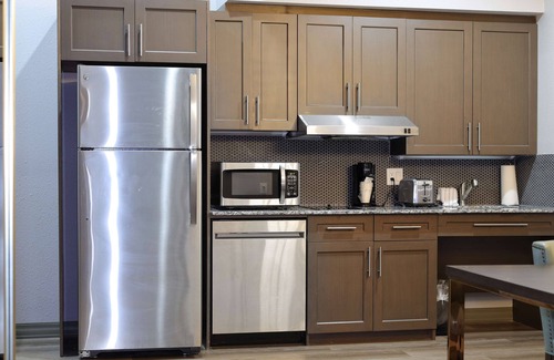 New Caney Hotel | Hotel Manhattan, BW Signature Collection