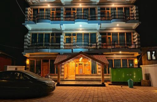 Kasol Hotel | Hotel Mid Orchard Kasol l River Side -Pure Veg Hotel