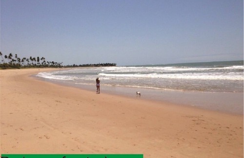 Itacimirim House | House in Guarajuba, foot in the sand, with eight suites.