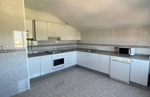 Carnota Ski Chalet | House in the middle of Carnota Beach, considered one of the best in Europe.