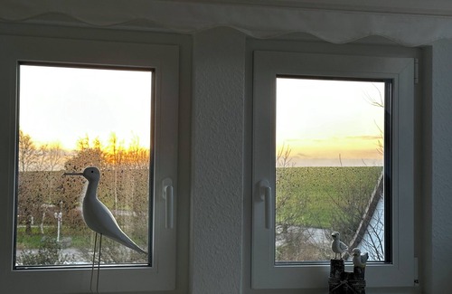Nordholz House | House "NordSeeStern", detached, right on the North Sea dike with a fireplace