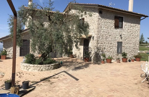 Terracina Apartment | House of the Olive Tree, in the Natural Park of the Ausoni Mountains and Lake Fondi.