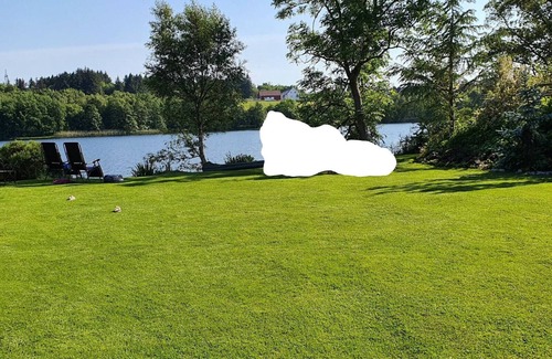 Sandnes Villa | House with big garden by water
