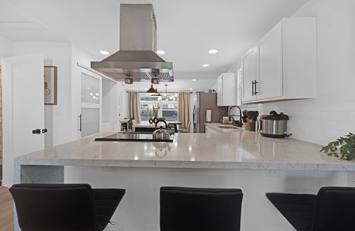 Westgate House | House with Fenced Yard - Palm Wave Says -