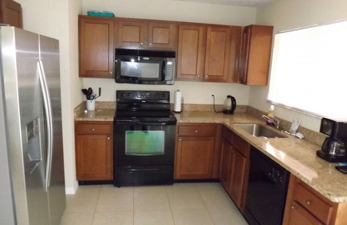 Port Charlotte House | House with solar heated pool and lake view!