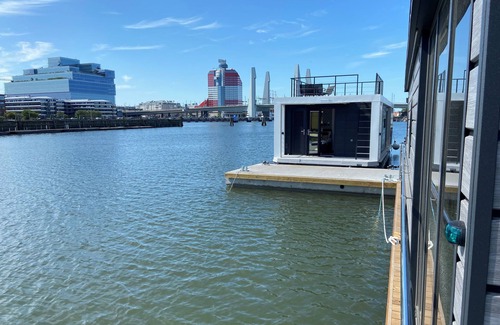 Lundby Boat Rental | Houseboat SVANESUND with roof terrace in the heart of Gothenburg