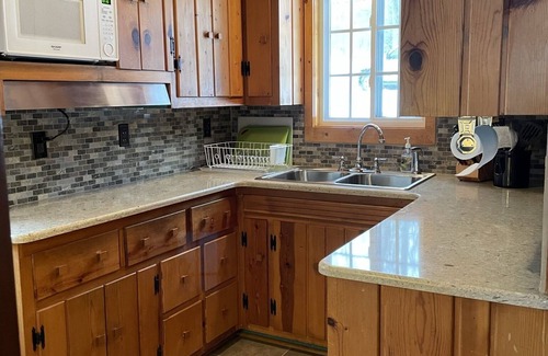Spruce Cottage | Hubbard Lake Sunset Hideaway, large lakefront property.