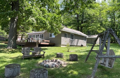 Spruce Cottage | Hubbard Lake Sunset Hideaway, large lakefront property.
