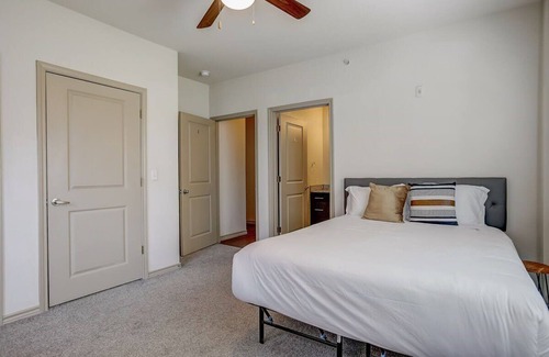 West Campus Apartment | Huge West Campus Flat + In-Unit Theater + Hot Tub