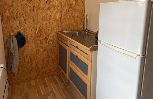 Lynge Apartment | Hyggelig Etværelses Lejlighed på Damgaarden