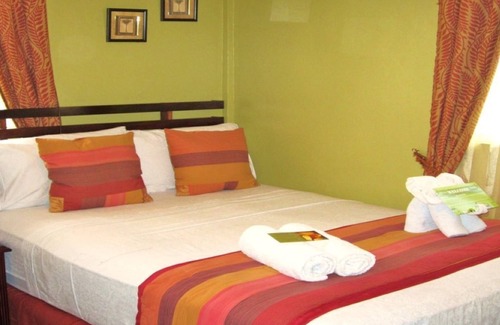 Roseau Bed & Breakfast | Ideally Located Gem Steps Away From Roseau! River, Mountain, River and Sea Views