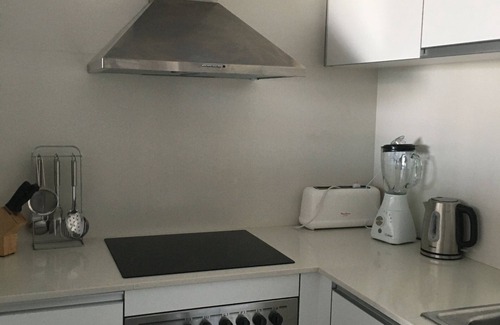 San Antonio Bay Apartment | Idilic Feng Shui Beach Front Apartment