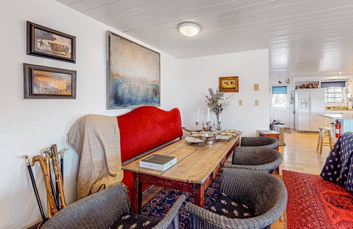 Marvel House | Idyllic rural home with private pond, river access, pool, patio, & covered decks