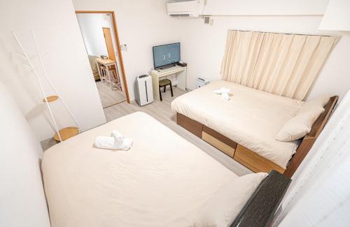 Kamiikebukuro Apartment | Ikebukuro East Exit Queen Bed Room
