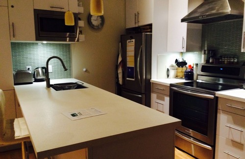 Lower Lonsdale Boat Rental | Immerse yourself in a classy & cozy, top level Floating Home! Pets welcome.