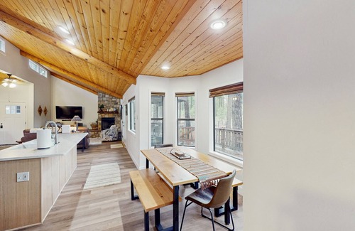Pinetop House | Immerse yourself in the charm of this delightful cabin tucked among the pines