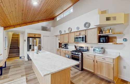 Pinetop House | Immerse yourself in the charm of this delightful cabin tucked among the pines