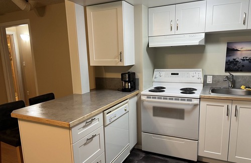 Central Kootenay Apartment | In the woods above Kootenay Lake, a nature lovers delight.