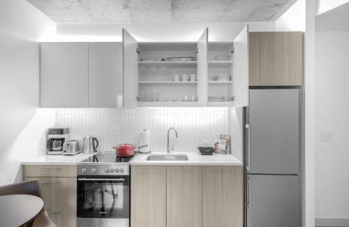 MIT Apartment | Industrial 1BR nr MIT w Gym Doorman Roof BOS-37
