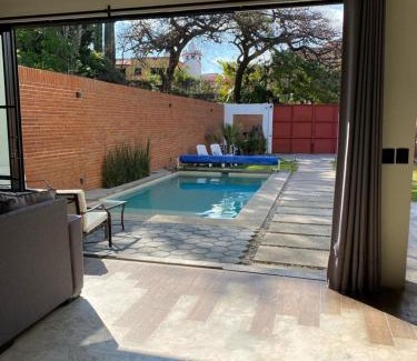 Ocotepec House | Industrialhaus Alberca privada y climatizada