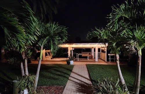 South Daytona House | Intercostal channel house with boat dock and ping-pong table