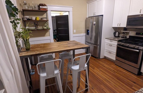 East Durham House | Inviting 2BR Sanctuary - Cozy Light Filled Bungalow with Two Screened Porches