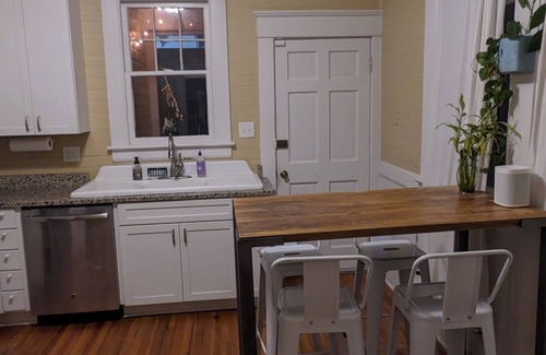 East Durham House | Inviting 2BR Sanctuary - Cozy Light Filled Bungalow with Two Screened Porches