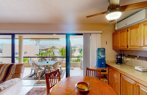 Zona Hotelera Apartment | Inviting apartment across from the beach with pool, grill, balcony & golf nearby