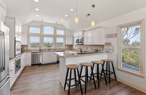 Pine Island House | Island Breeze: Heated Saltwater Pool | Rec Room