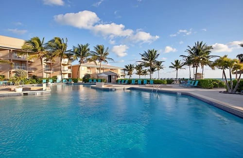 Crystal Harbour Apartment | Island Escape! Oceanfront Property, Outdoor Pool, Free On-site Parking!