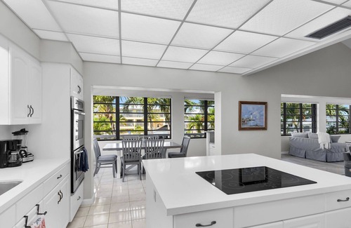 Coury House | Island Paradise-large 2 bedroom/2 bath SFH with Cabana club and 75ft of dockage