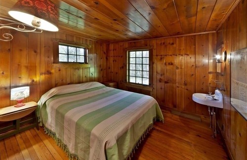 Milford Cabin | Isolated Creekside Knotty Pine 1930s Lodge on 575 Acre Forest Preserve