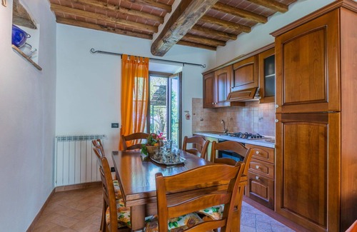 Castelnuovo di Val di Cecina Apartment | Cosy apartment for 12 guests with pool, A/C, WIFI, TV, patio and pets allowed