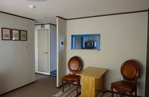 Ikuno Apartment | It has a kitchen, closet, shoe closet, washing machine, balcony and parking space. Clothes can be dried on the balcony, or room-dried. The 46 sq. m. of space is ideal for long-term stays.