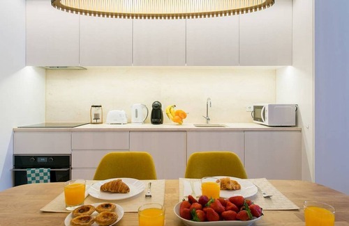 Chiado Apartment | JOIVY Sunny 1-bed flat w/terrace&sea view in Baixa,3mins to Arco da Rua Augusta