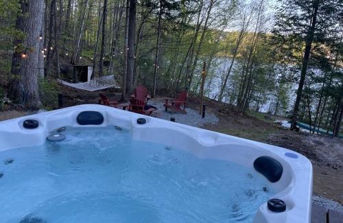 Bowman Ski Chalet | Joy's Chalet - Hottub, Lake, & Cottage