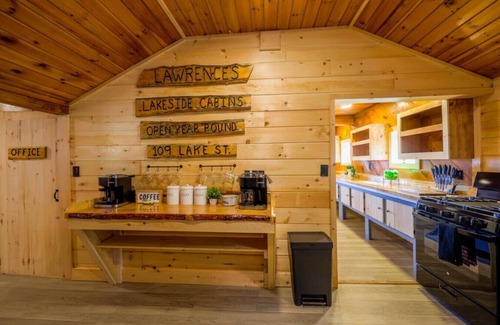 Northeast Somerset Cabin | Katahdin - Cabin 4 · Lawrence's Lakeside Cabins | 'Katahdin': Boat Dock + Kayaks