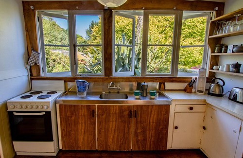 Pohara House | Kereru Cottage - Pohara Holiday Home