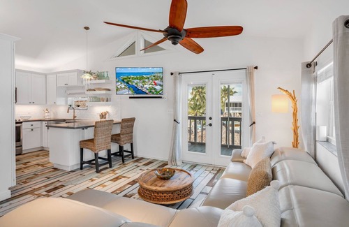 Twin Lakes House | Key Largo Canalfront Home w/Boat Lift, Swim Spa, Tiki Hut & Game Room